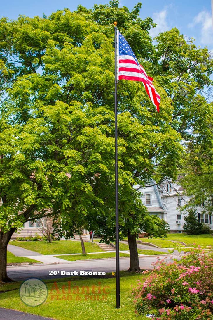 Phoenix telescoping flagpole in silver with American flag, Securi-Shur anti-theft clamp, and Atlantic Flag and Pole branding