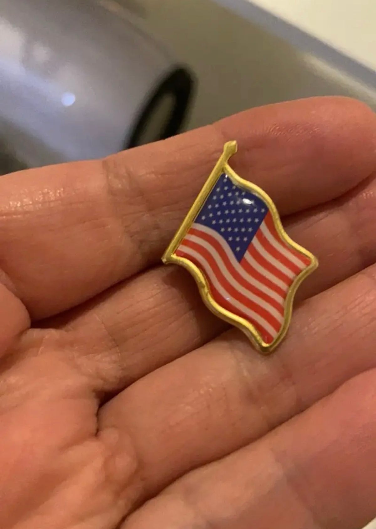 American Flag Lapel Pin front - waving USA flag enamel with gold border