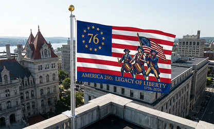 America 250th Legacy of Liberty flag flying on building — limited edition commemorative flag