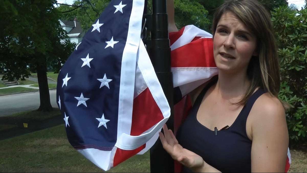 Large nylon American flag in vibrant red, white, and blue by Atlantic Flag and Pole Inc, available in multiple sizes.