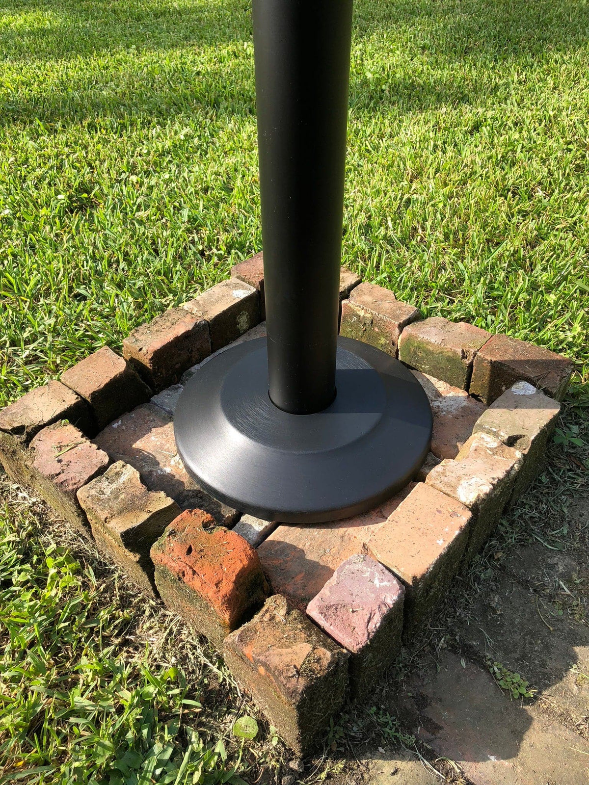 Black bronze anodized aluminum flash collar for flagpole base, compatible with 2.5 and 3-inch holes by Atlantic Flag & Pole 
