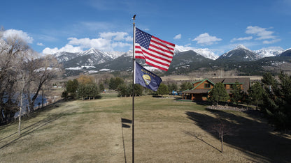 Large American flag in nylon, featuring bold red, white, and blue colors, by Atlantic Flag & Pole Inc.