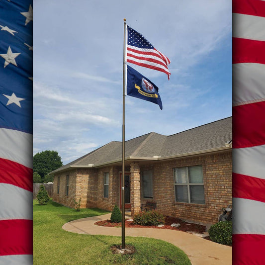 Gold telescoping flagpole kit with USA and state flags, showcasing 15-foot height, ideal for residential display.